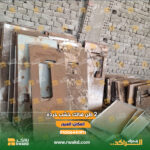 هوالك خشب صناعي داخل مخزن مصنع، مناسبة لإعادة التدوير واستخدامات التغليف والتشغيل الصناعي، معروضة من خلال منصة رواكد للاقتصاد الدوار وتحريك الرواكد الصناعية.